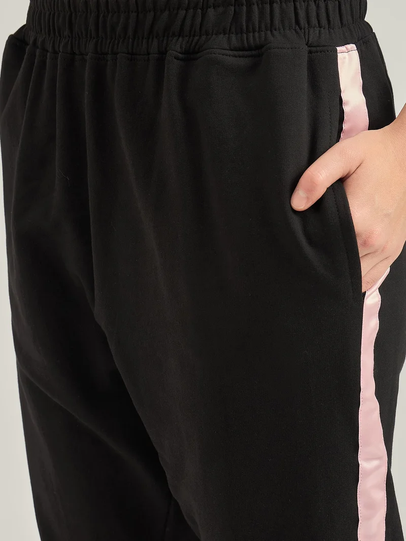Outzidr  Black Side Tape Printed Sweatpants for Women | Best Price UAE